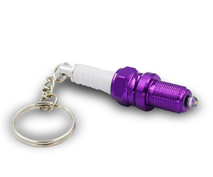 LED light spark plug keychain